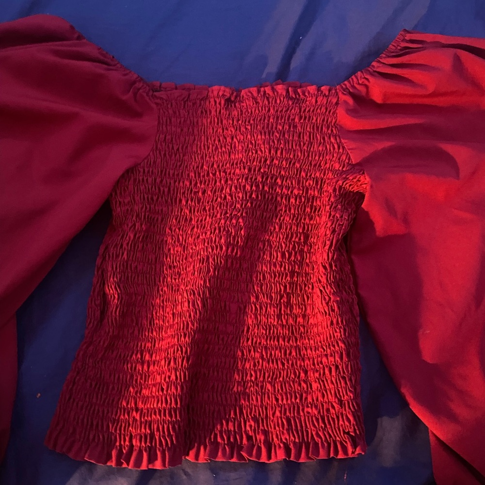 maroon colored shirt